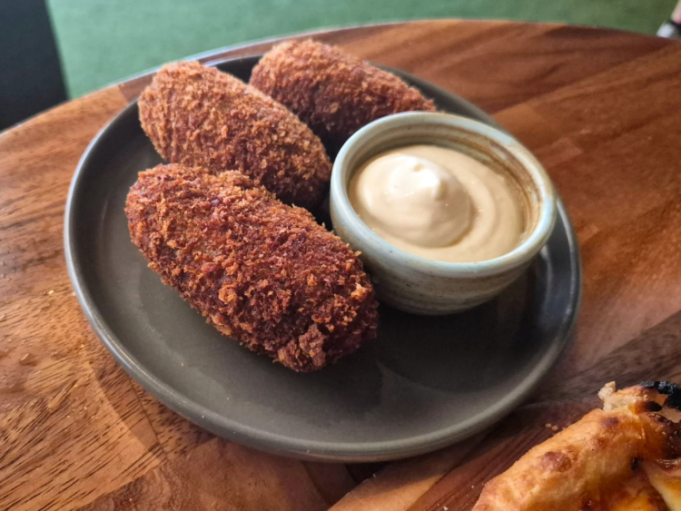 The Emerald Peacock slider image